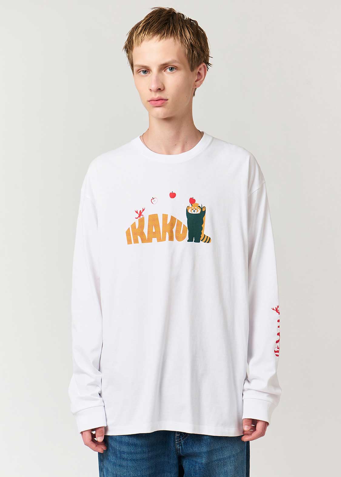 こちらはA.G.H.Eです。 イカクキャッチングアンアップル｜長袖Tシャツ｜ユニセックス